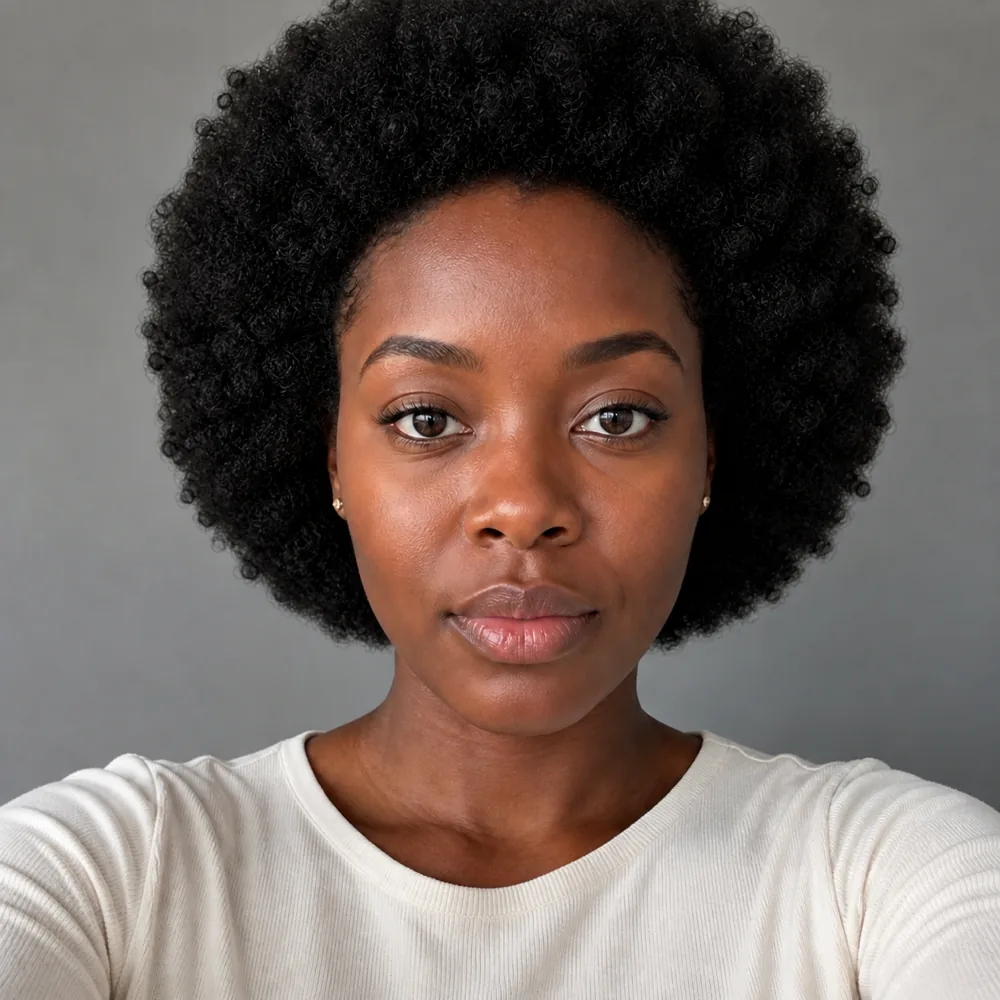 Amara with a voluminous rounded afro